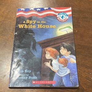 Scholastic Blue and Red Paperback — A Spy in the White House Back Cover